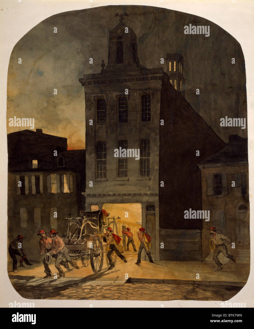 Feuerwehrmänner aus der Weccacoe Engine Company ziehen eine handgezeichnete Feuerwehrauto als andere Feuerwehrmänner Gerangel garkochen. Philadelphia, Stockfoto