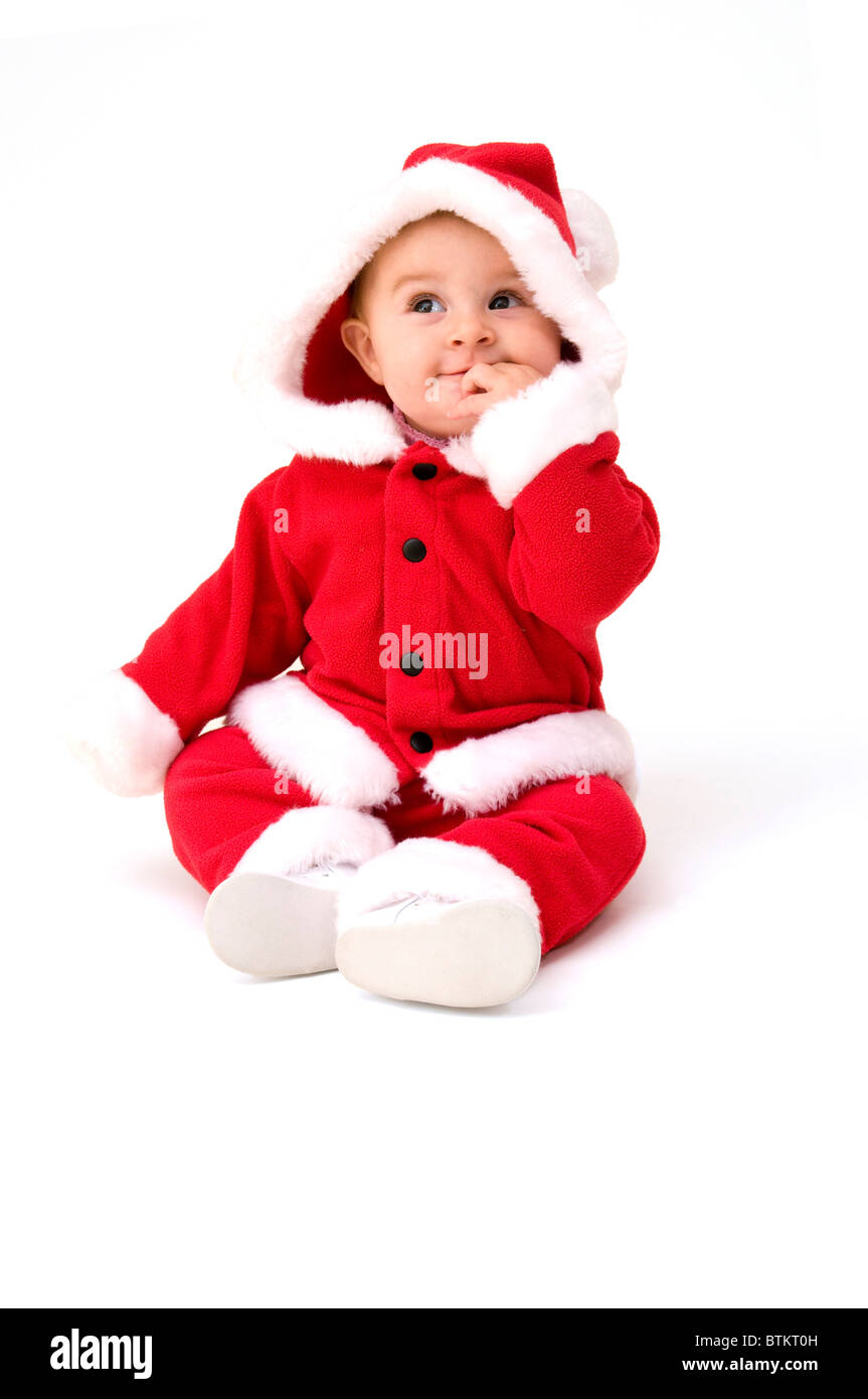 Niedliche Baby verkleidet für Weihnachten. Isolated on White Background. Stockfoto