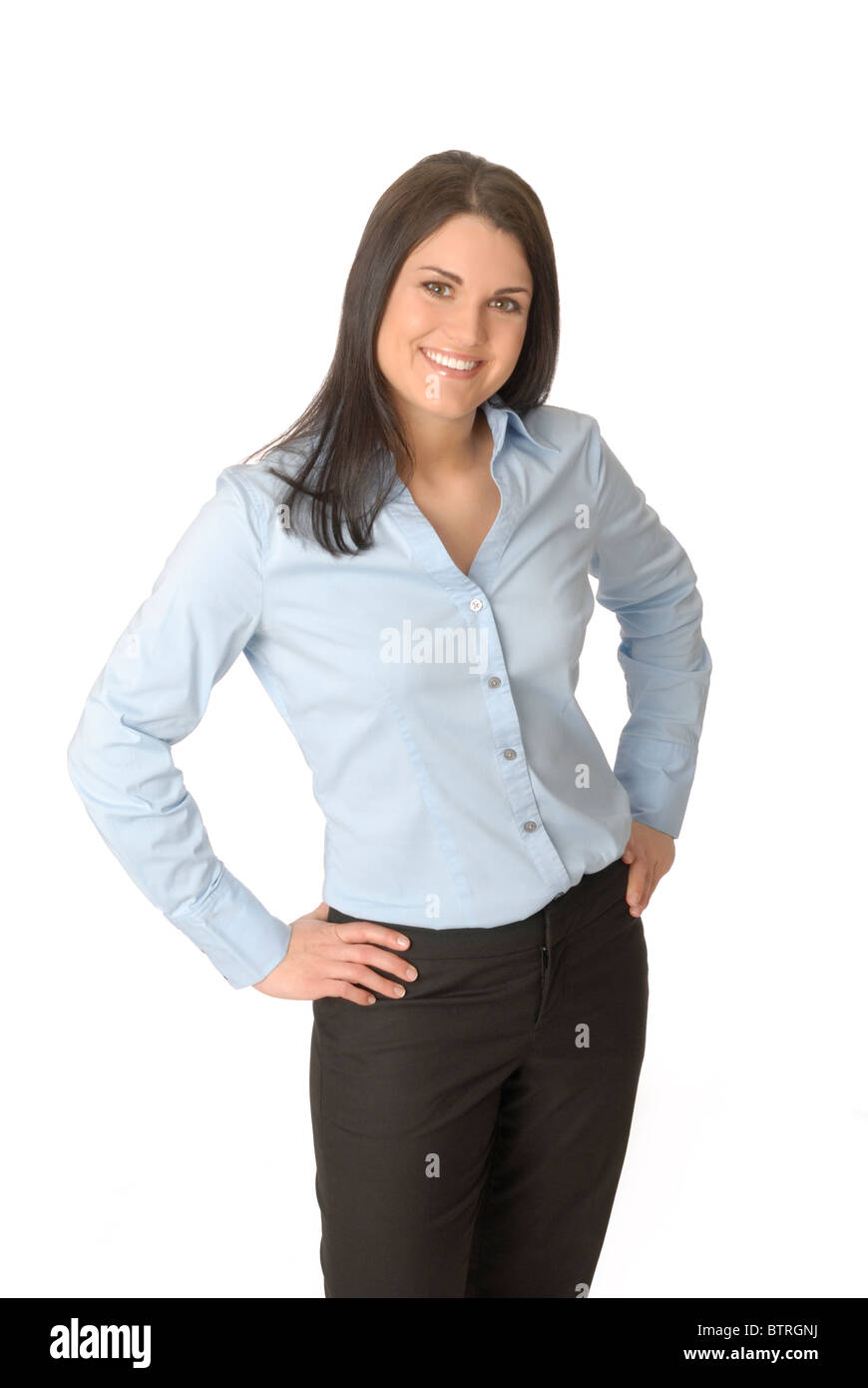 Attraktive, lächelnde Frau tragen blaue Bluse und schwarze Hosen  Stockfotografie - Alamy