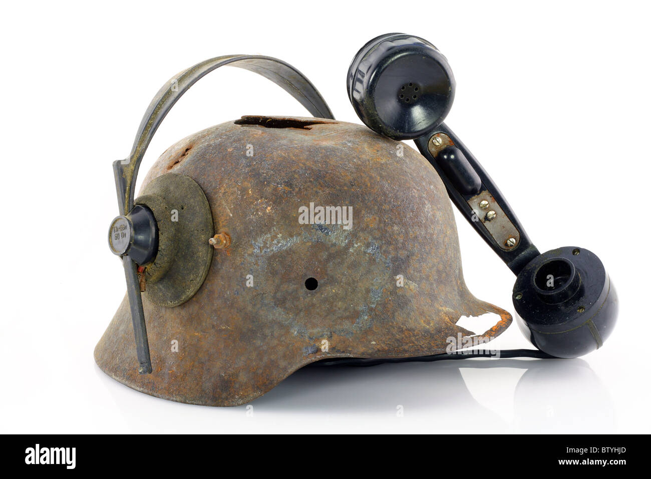 Stahlhelm und Telefone Stockfoto