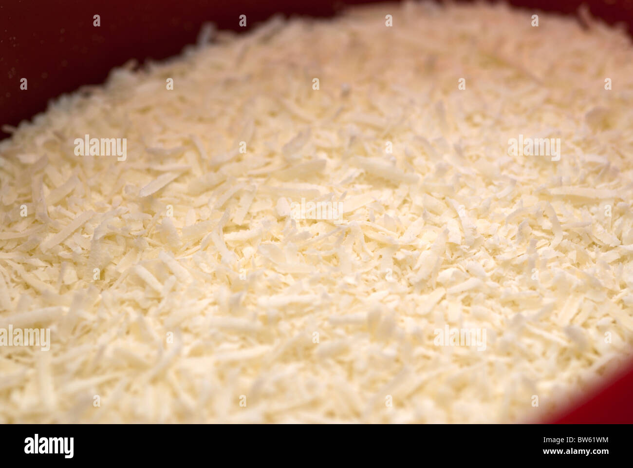 Geriebener Parmesan-Käse Stockfoto