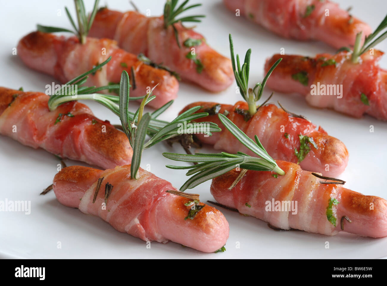 Honig glasierte Schweine in Decken Stockfoto