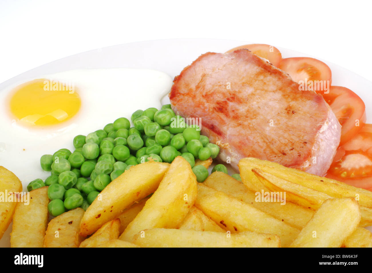 Schinken mit Spiegelei und Pommes frites Stockfoto