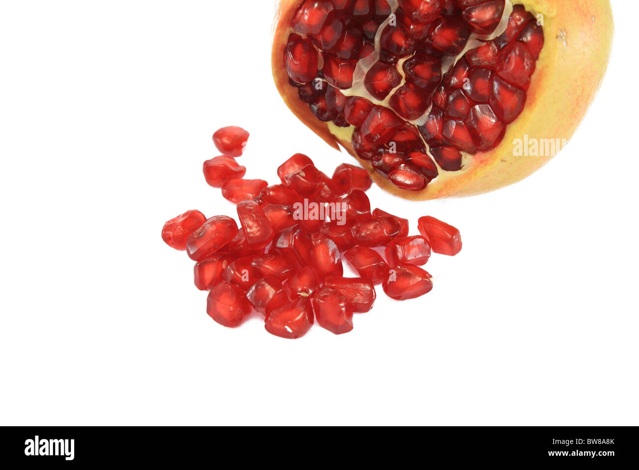 Granat-Apfel mit Samen mit weißem Hintergrund Stockfoto