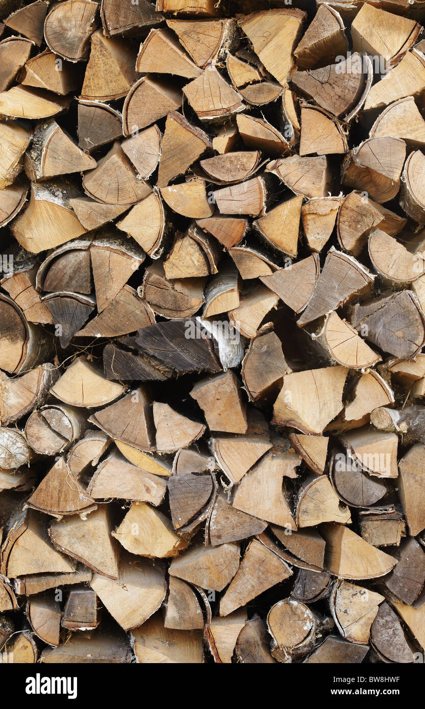 Hintergrund - meldet sich der Stapel Brennholz aus Birke Stockfoto