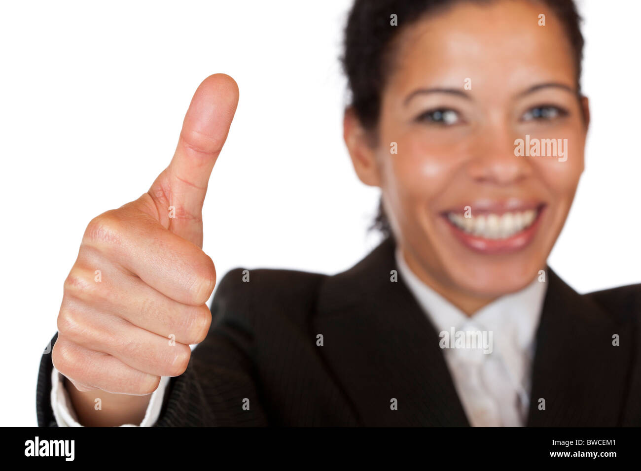 Lächelnd selbst, die zuversichtlich Geschäftsfrau Daumen auftaucht. Isoliert auf weißem Hintergrund. Stockfoto