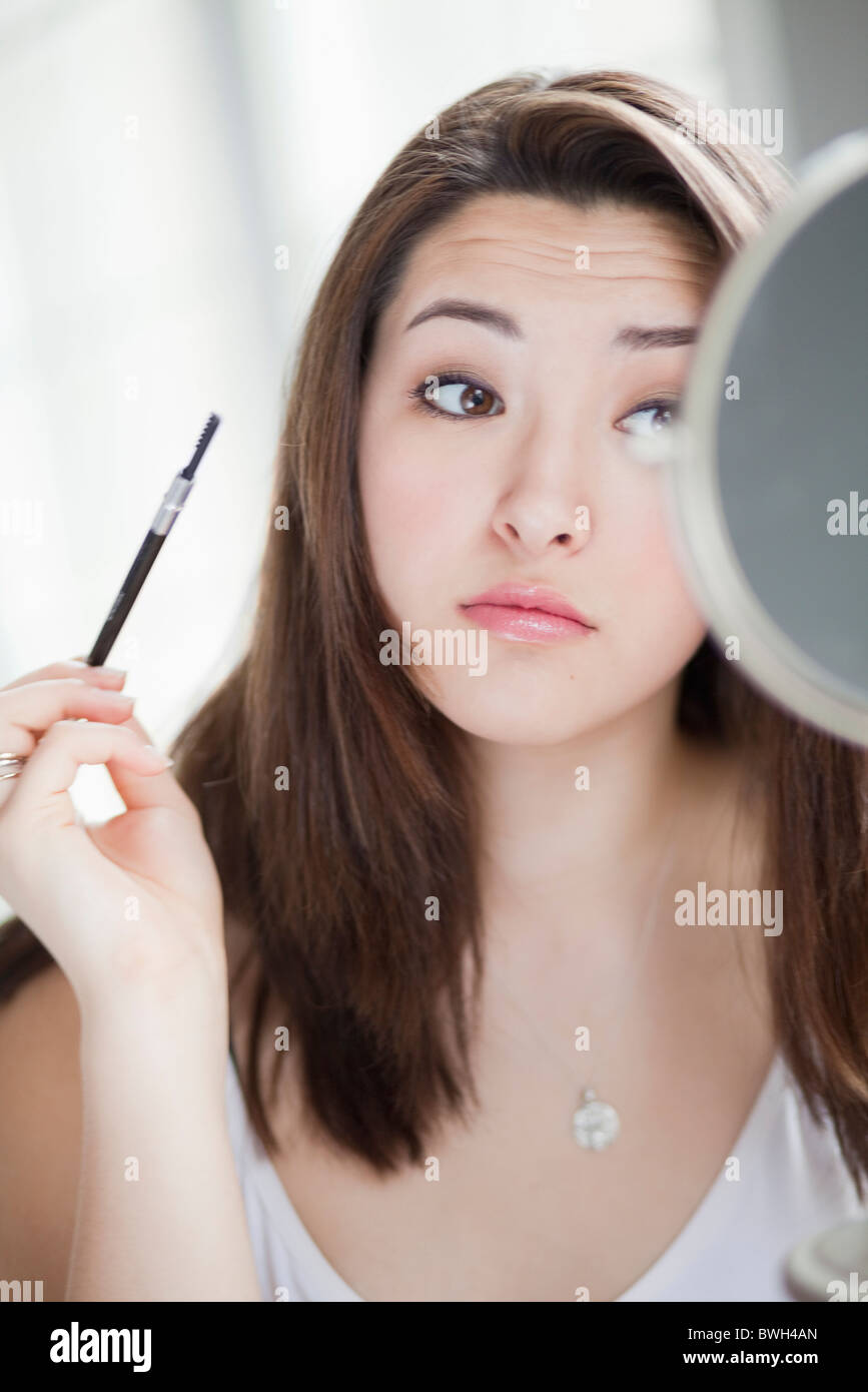 Mädchen im Spiegel Stockfoto