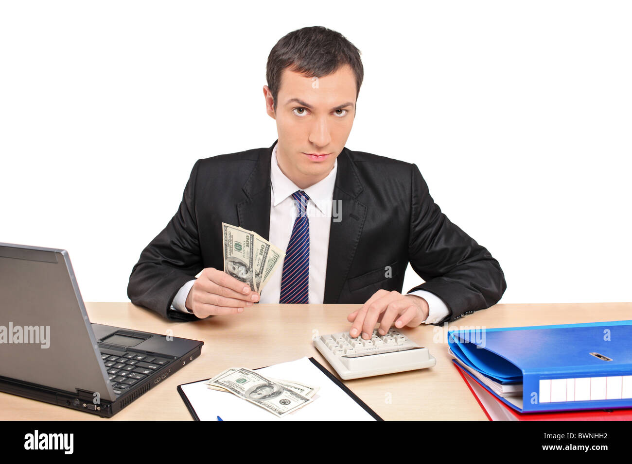 Eine Ansicht eines Geschäftsmannes Geldzählen in seinem Büro Stockfoto