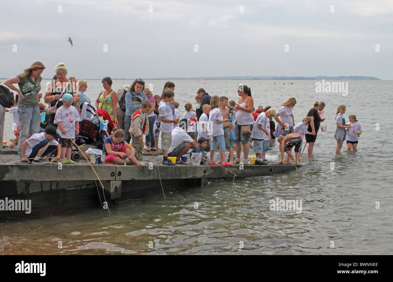 Verdrehungen während der Whitstable Hafen Oyster Festival Wettbewerb. Stockfoto