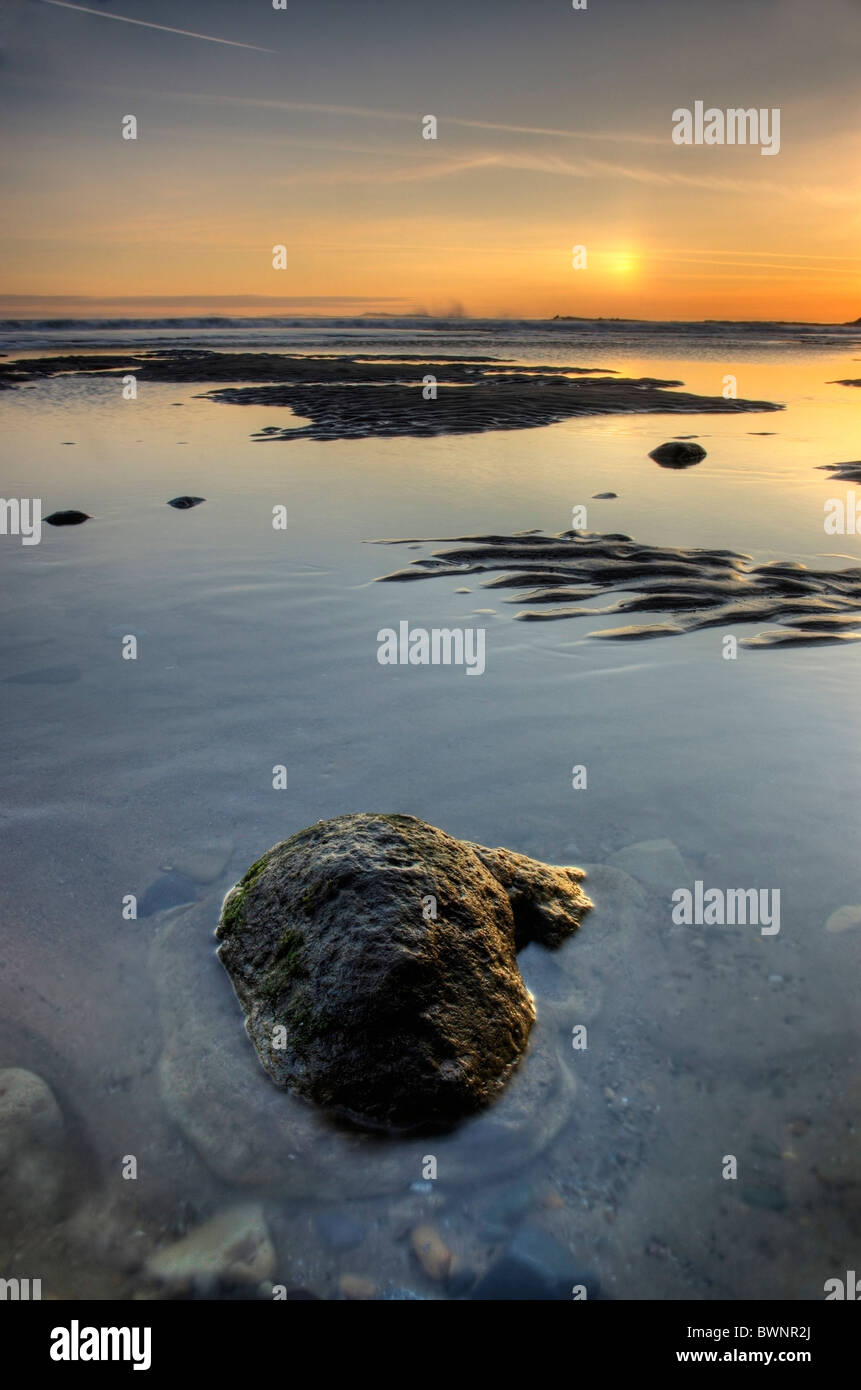 Sonnenaufgang am Cayton Bay, North Yorkshire Stockfoto