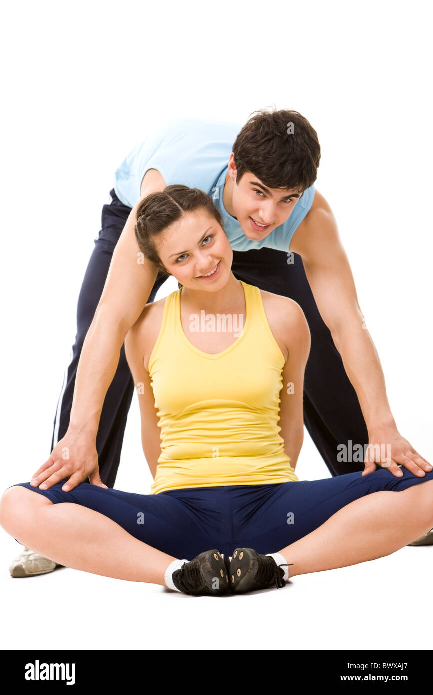 Foto von hübschen jungen Frau und Sport-Lehrer, Blick in die Kamera während des Trainings Stockfoto