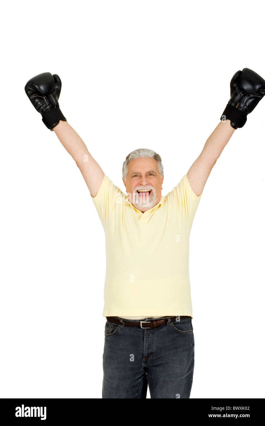 älterer Mann mit Boxhandschuhen Stockfoto