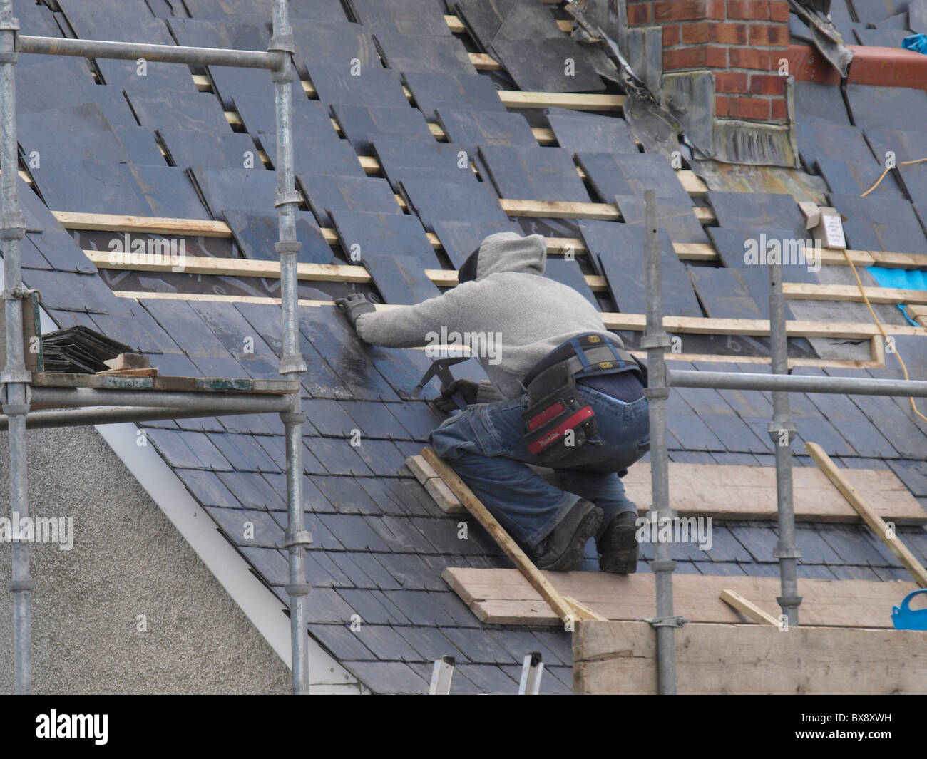 Dachdecker bei der Arbeit, UK Stockfoto