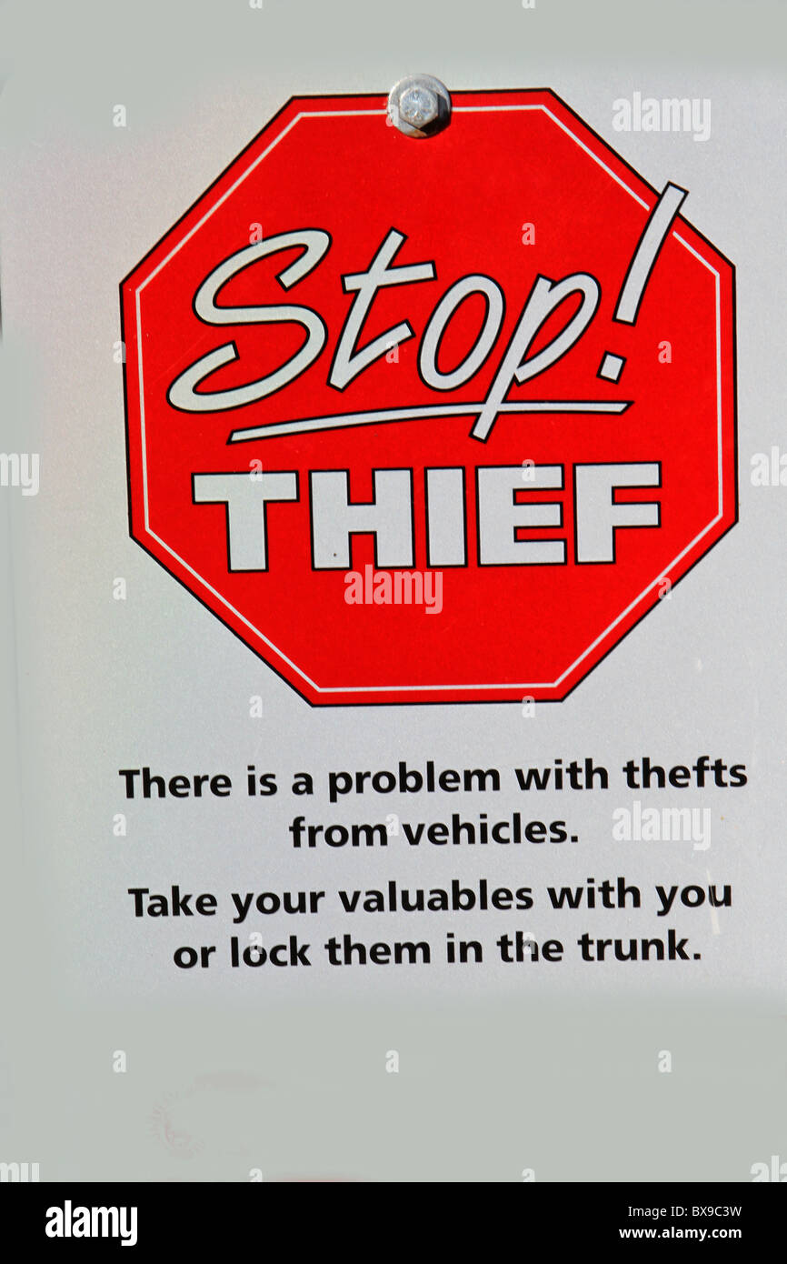 Rote Stoppschild Dieb Stockfoto