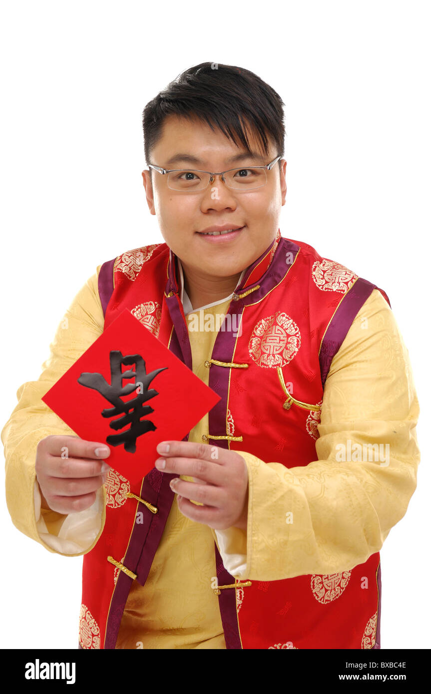 Mann hält ein chinesisches Neujahr-couplet Stockfoto