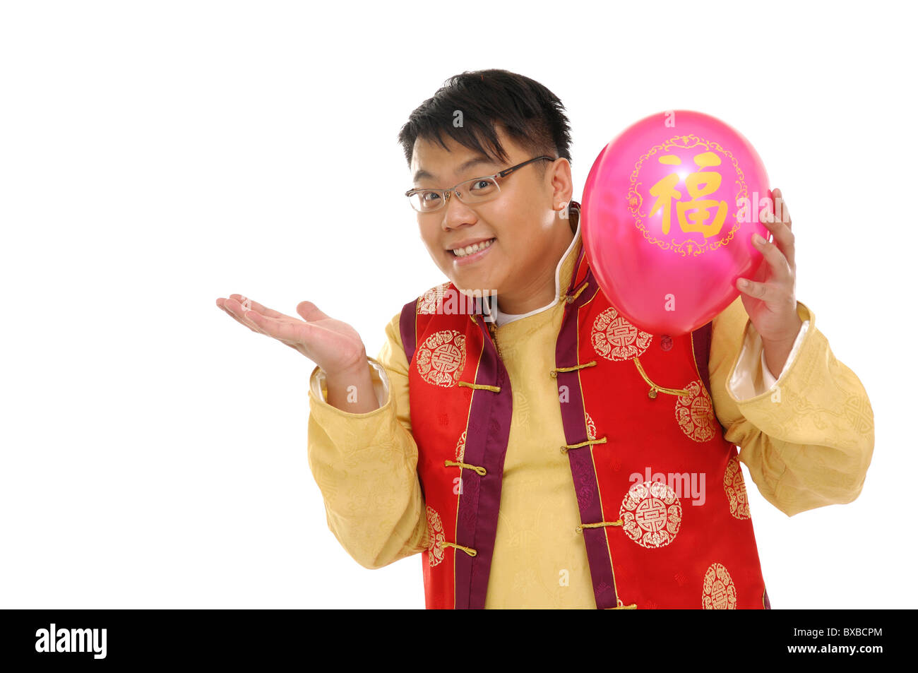 Mann hält einen Ballon und lächelnd Stockfoto