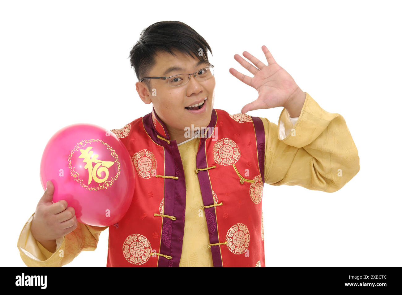 Mann hält einen Ballon und lächelnd Stockfoto