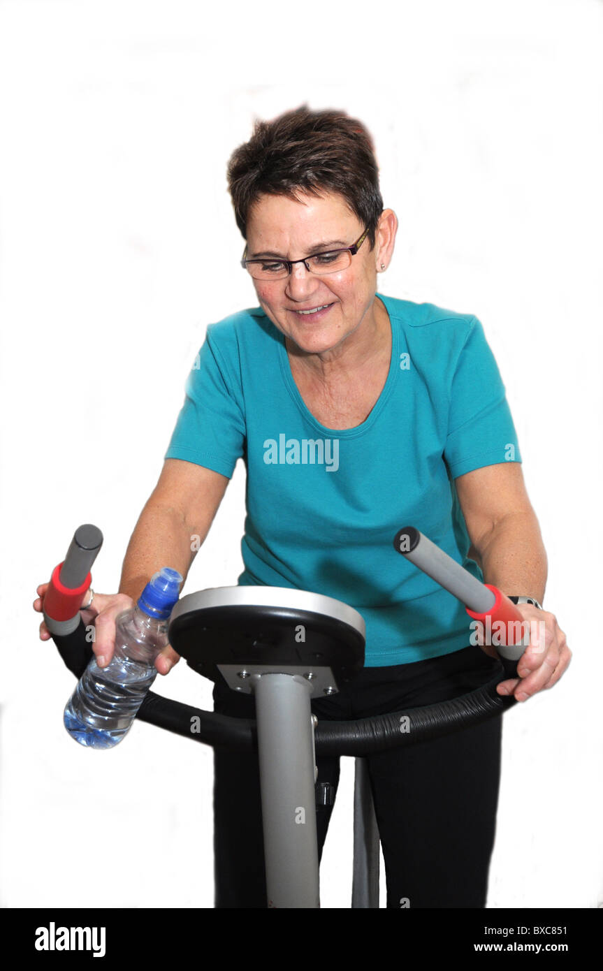 Ältere Frau genießen ihren täglichen home Training Stockfoto
