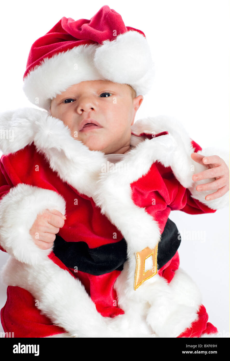 Einen Monat alt Babyjungen in ein Weihnachtsmannkostüm für Weihnachten Stockfoto