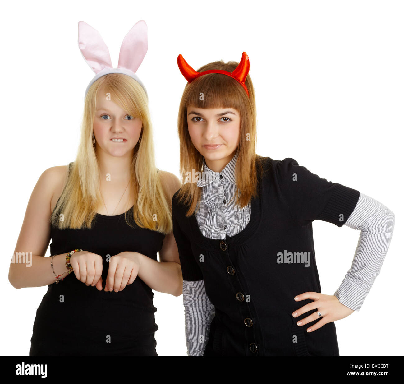 Zwei Mädchen - Freundinnen in Kostüme auf weißem Hintergrund  Stockfotografie - Alamy