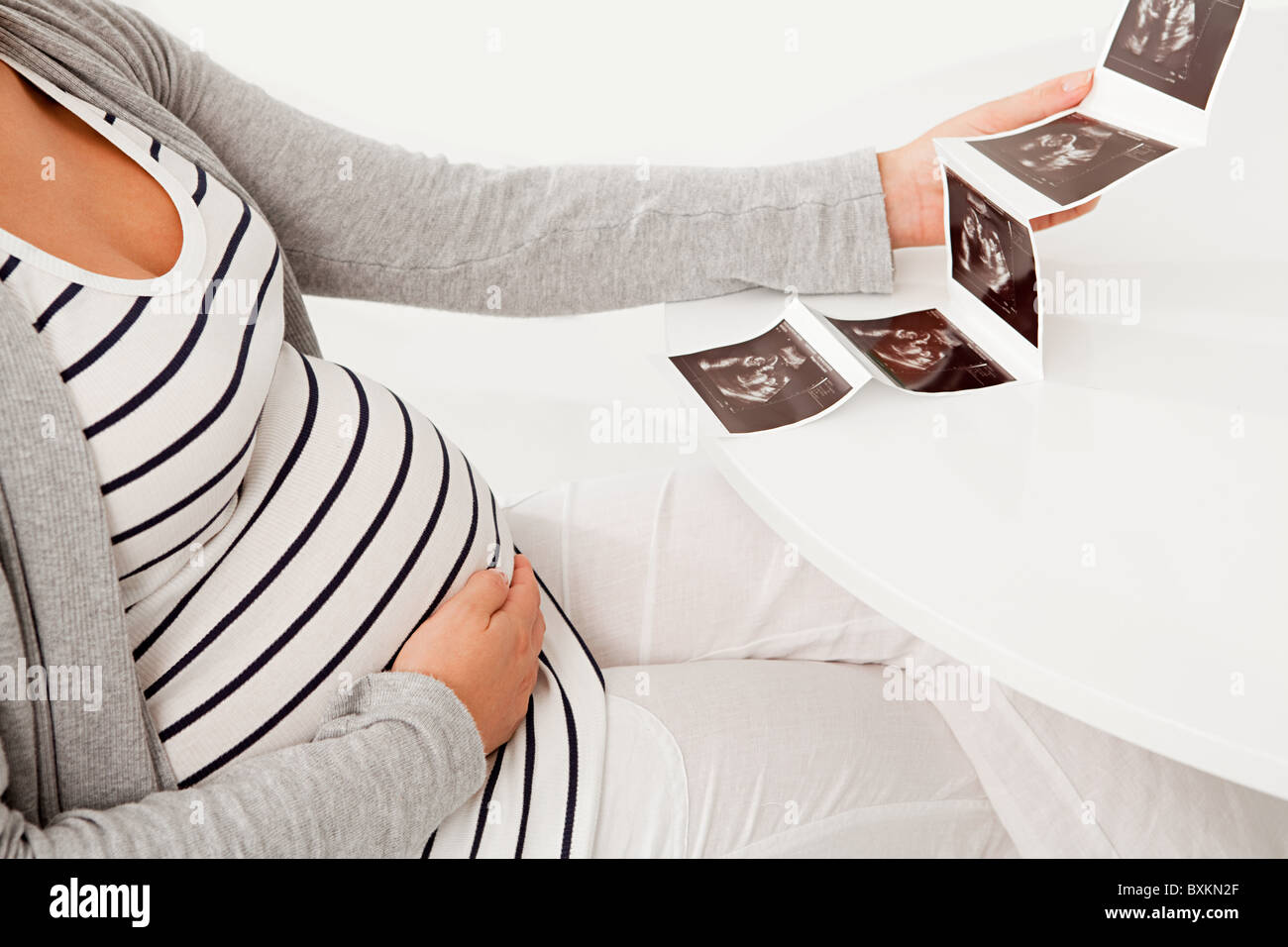 Schwangere Frau mit Baby-scan Stockfoto