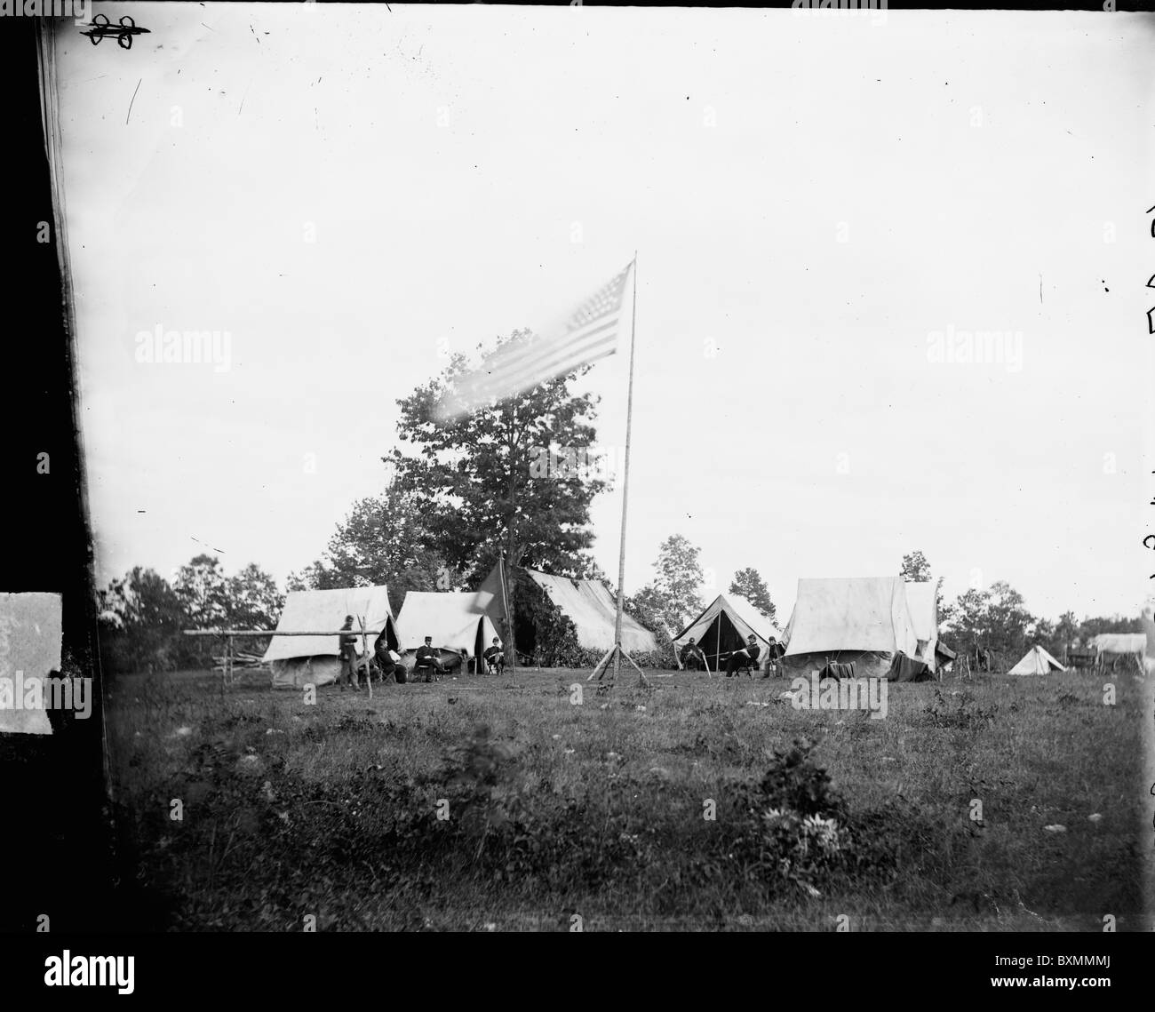 Amerikanische Flagge über Union Camp Zelte Stockfoto