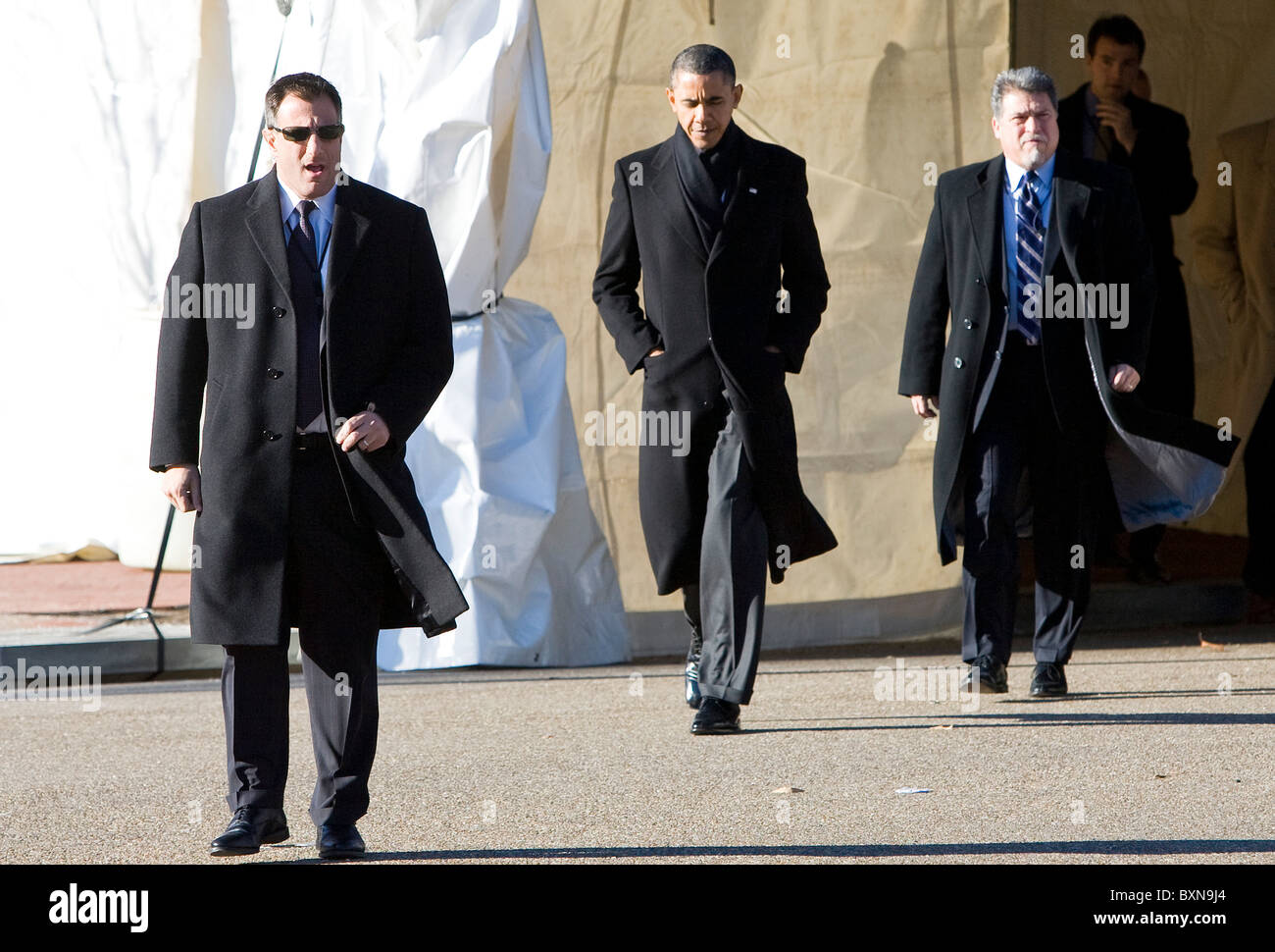 Präsident Barack Obama kreuzt Pennsylvania Avenue. Stockfoto
