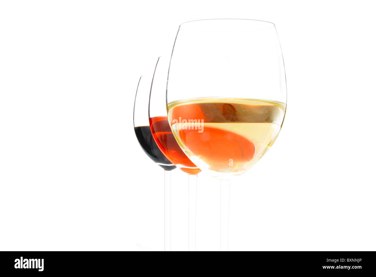 Käse und drei Gläser Wein Stockfoto