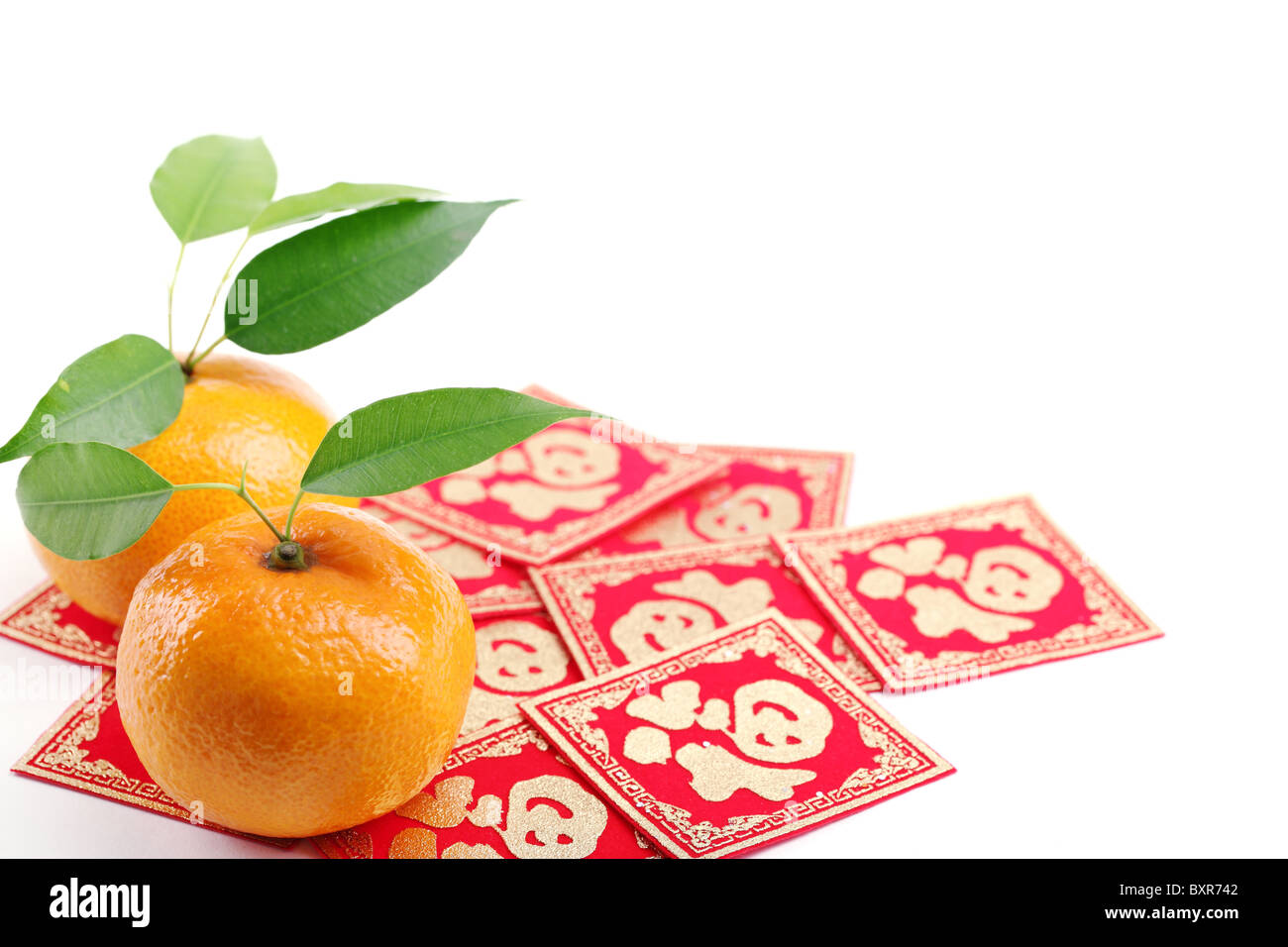 Mandarinen und 'Fu' Charakter, Nahaufnahme. Stockfoto