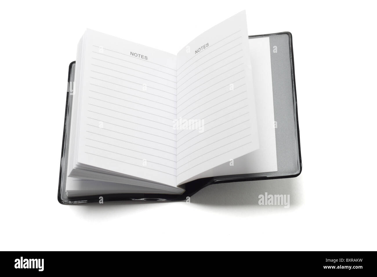 Minitasche Notizbuch auf weißem Hintergrund Stockfoto