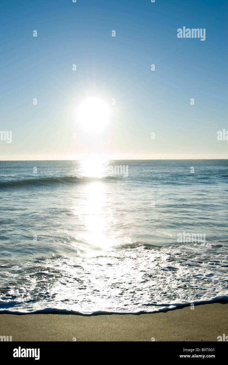 Sonnenaufgang am Strand Stockfoto