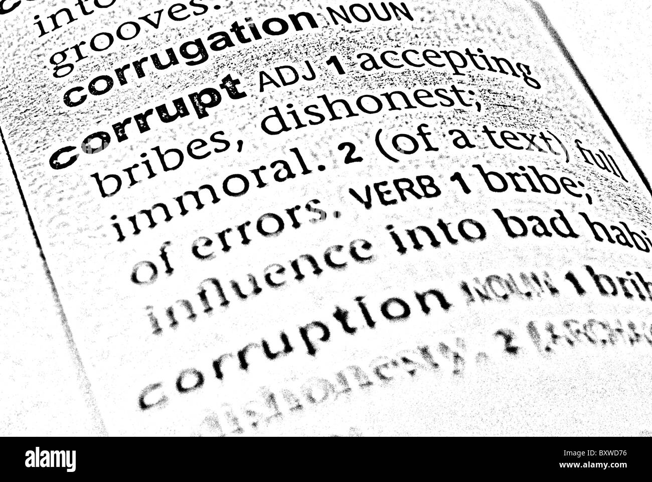 Eine ausführliche Foto-Illustration der korrupten Wort Beschreibung in ein englisches Wörterbuch. Stockfoto