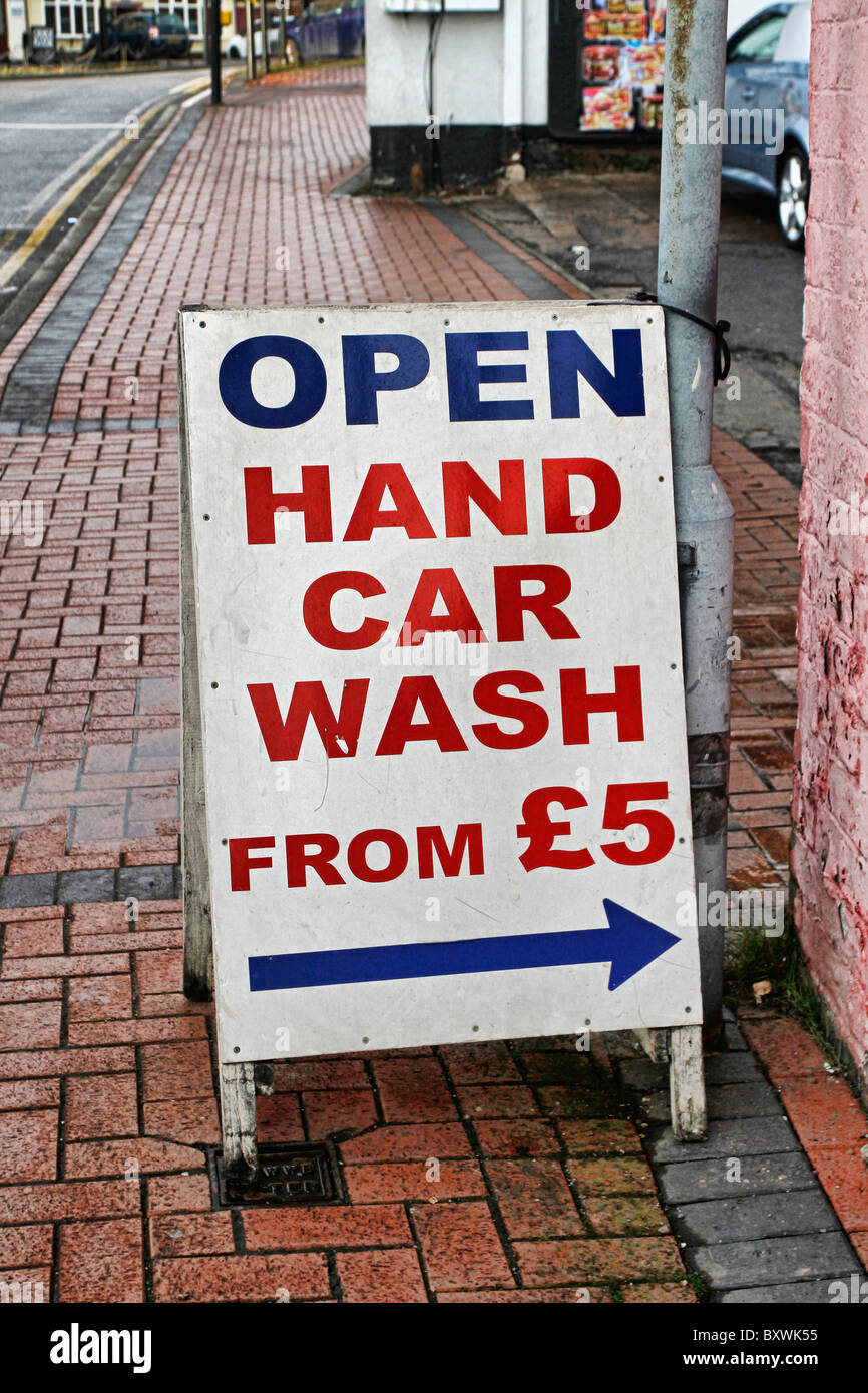 Auto-Waschanlagen-Handzeichen Stockfoto
