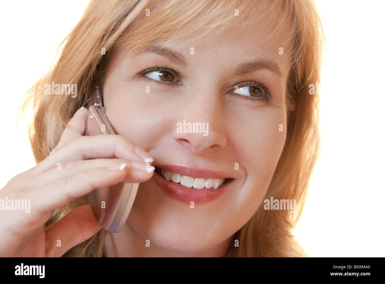 Glückliche Frau auf Handy Stockfoto