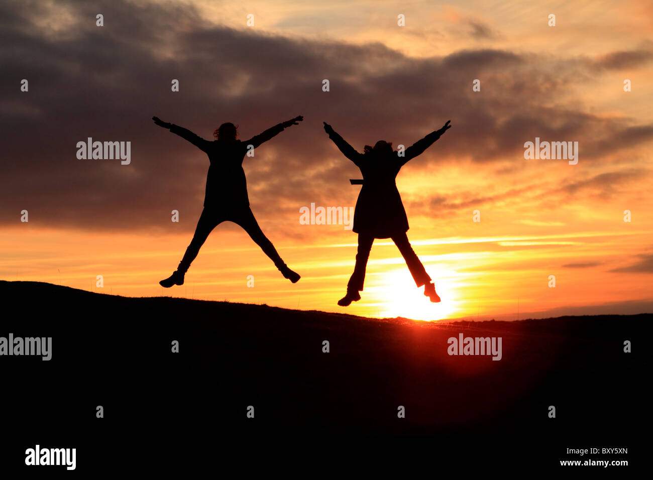 Sonnenuntergang Sterne Sprünge Stockfoto