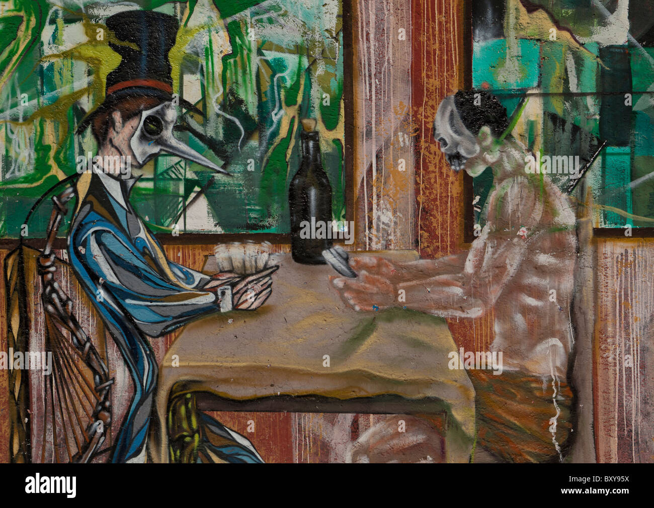 Wandbild zeigt zwei Männer Spielkarten entlang einer Straße in der spanischen kolonialen Stadt Santiago de Querétaro, Queretaro, MX Stockfoto
