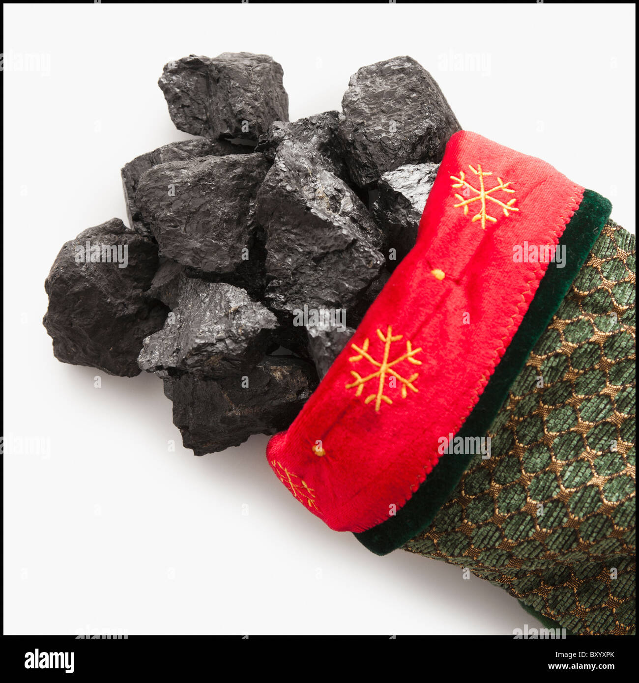 Kohle in Weihnachts-Strumpf Stockfoto