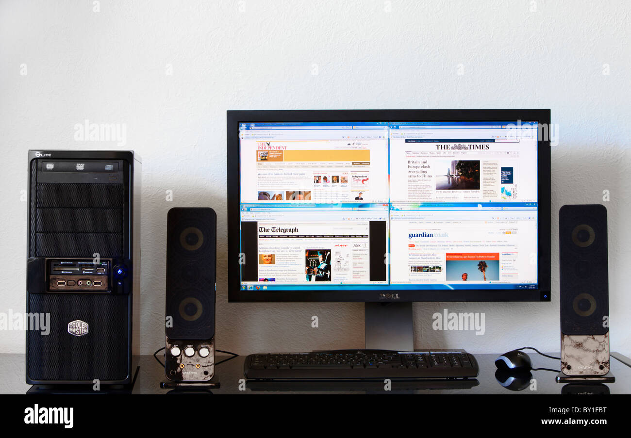 Computer, The Times, The Telegraph, The Guardian und The Independent Zeitung Websites zeigen. Stockfoto
