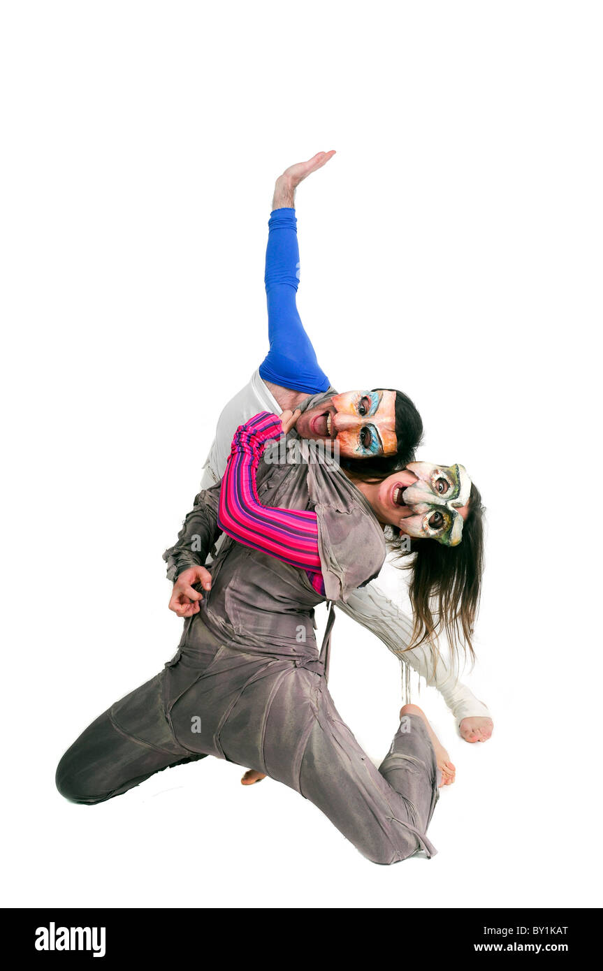 Maskierte Schauspieler in ein physisches Theater auf weißem Hintergrund Stockfoto