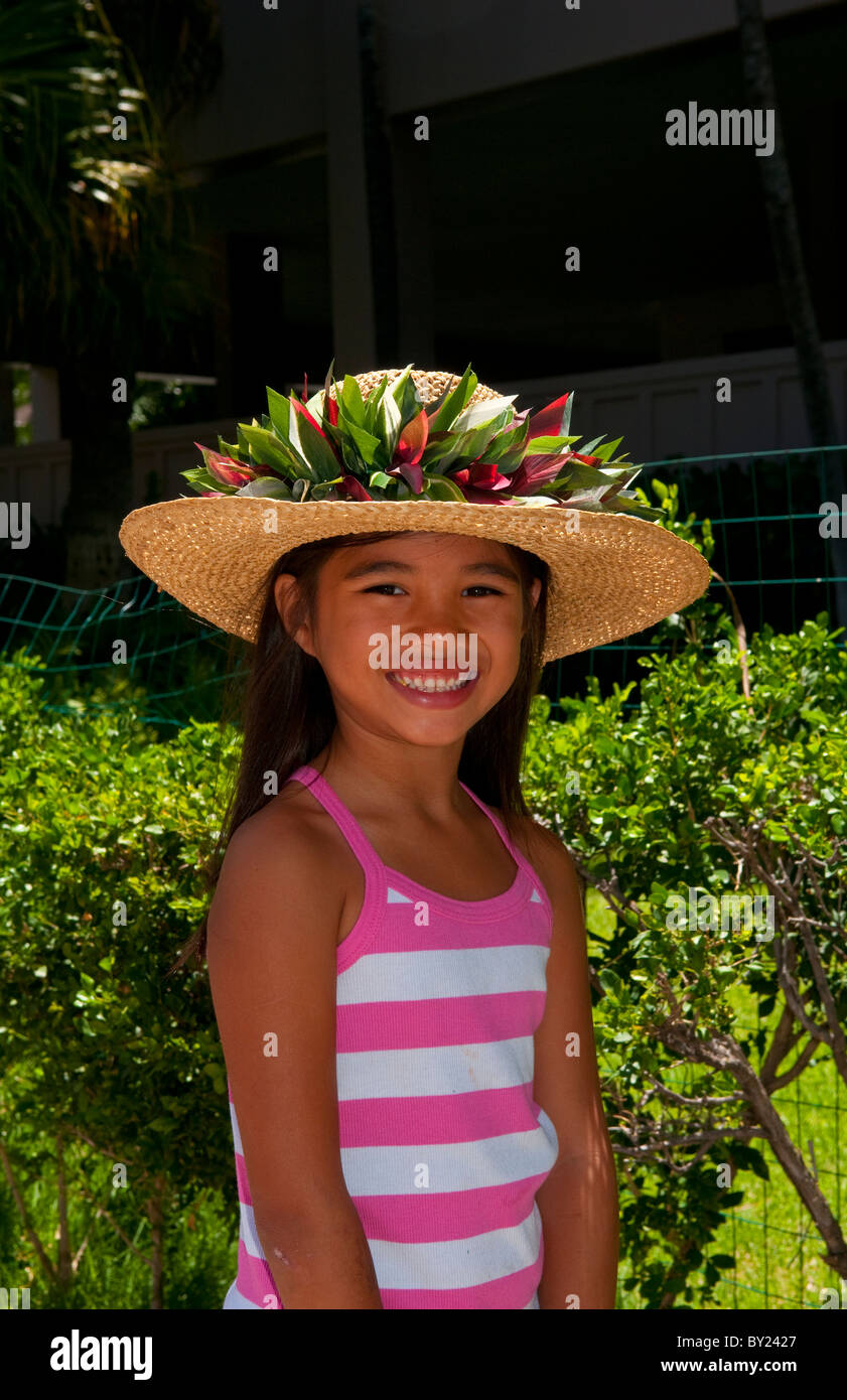 Schöne lokale Hawaiian Mädchen im Alter von 8 in tropischen Hut in Honolulu Hawaii Stockfoto