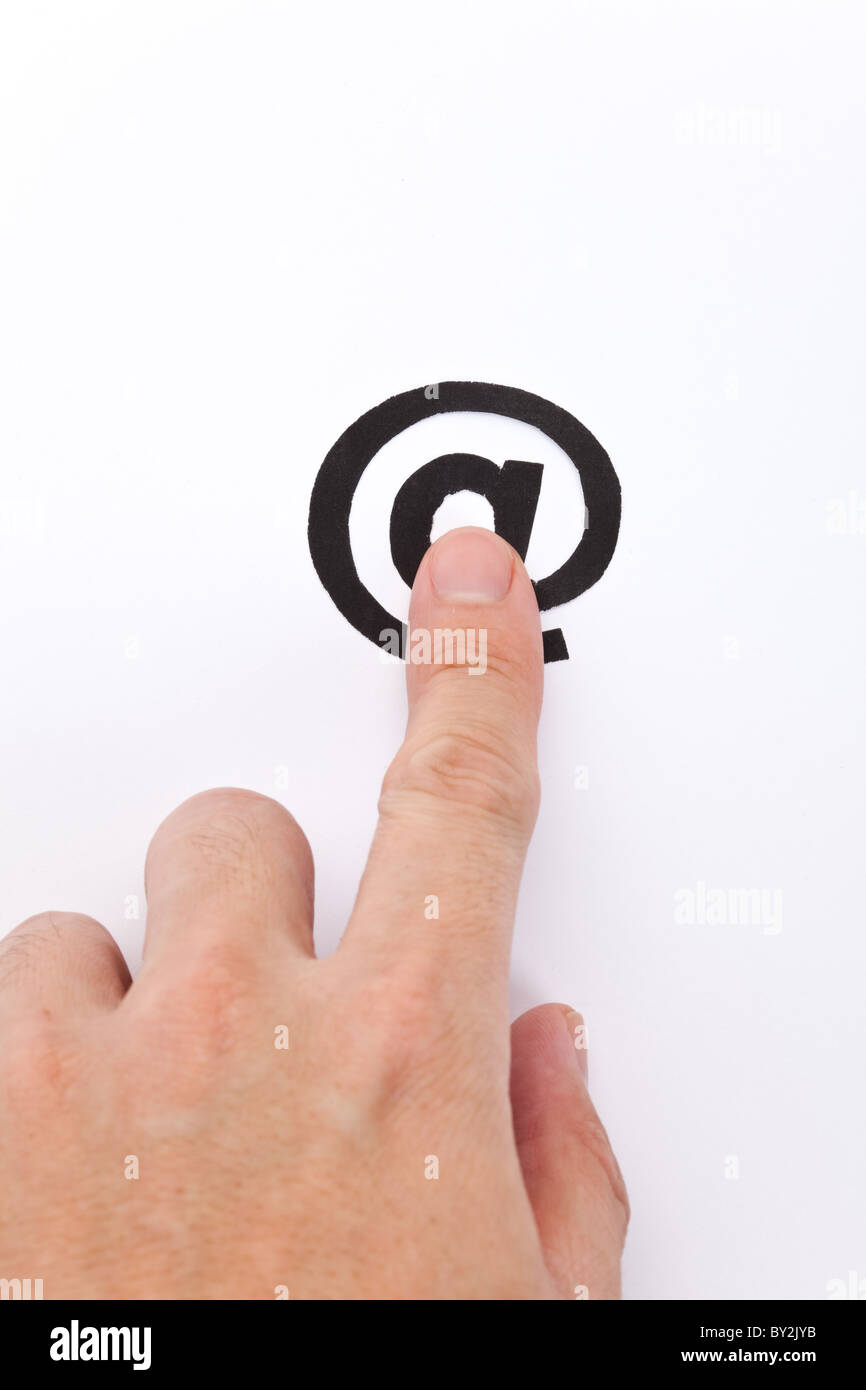 Hand und 'at' Symbol, e-Mail-Konzept Stockfoto