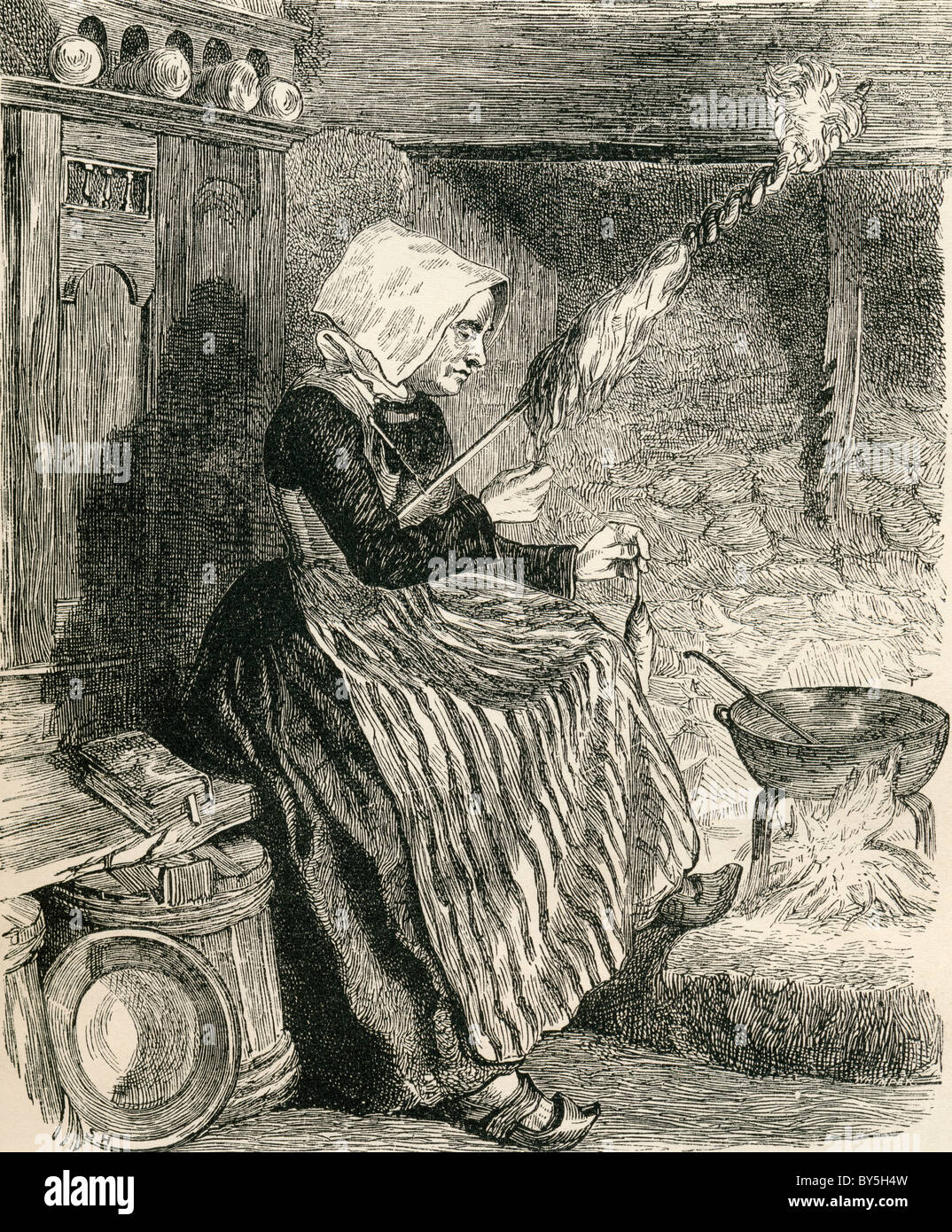 Eine bretonische Bäuerin im the19th Jahrhundert Wolle spinnen. Von Französisch Bilder von The Reverend Samuel G. Green veröffentlichte 1878. Stockfoto