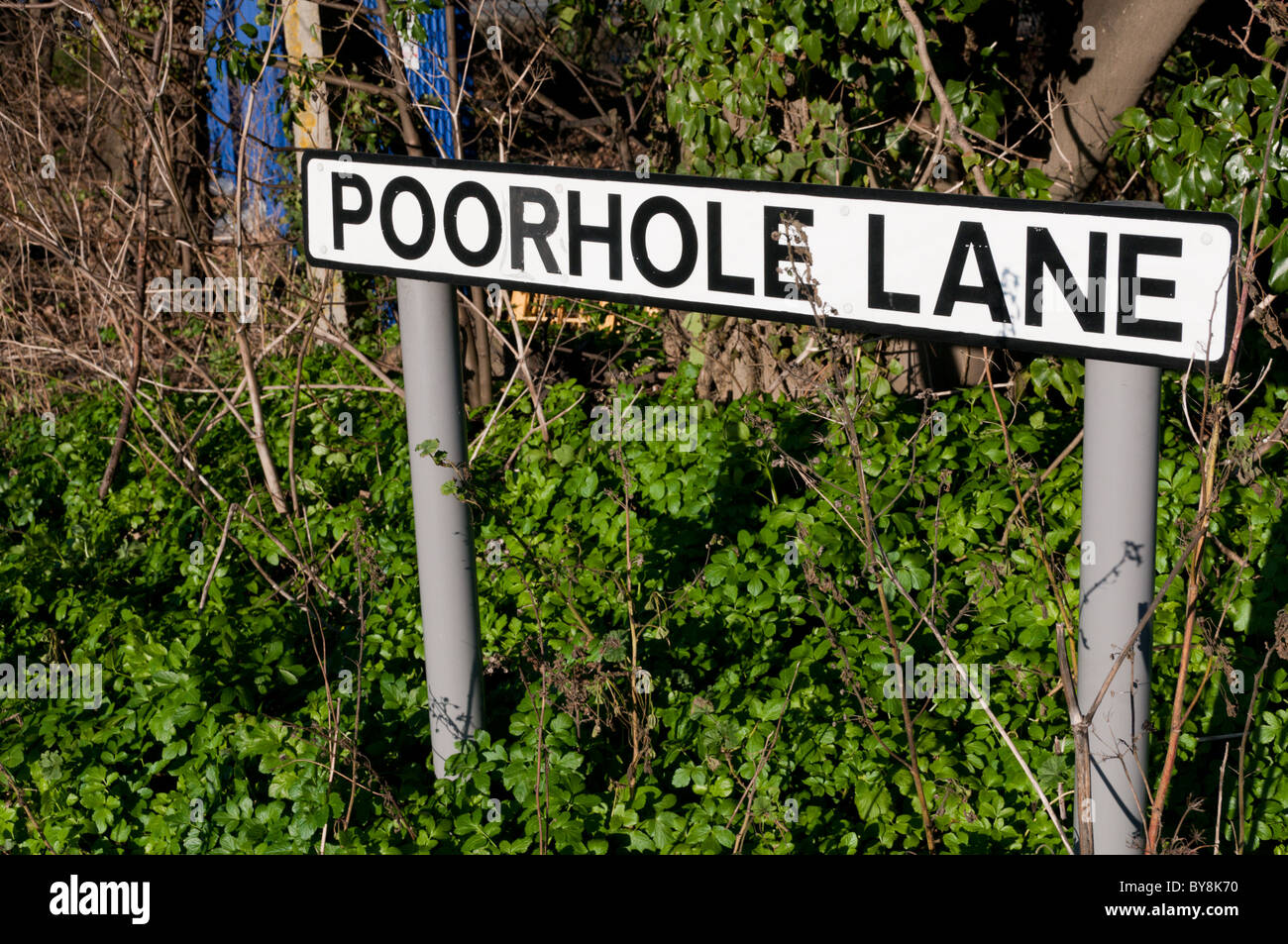 Ein Zeichen für Poorhole Lane, England. Stockfoto