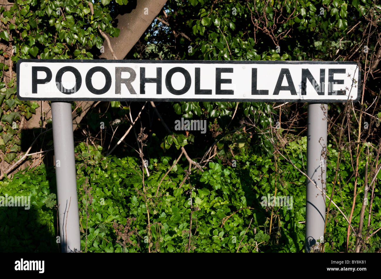 Ein Zeichen für Poorhole Lane, England. Stockfoto