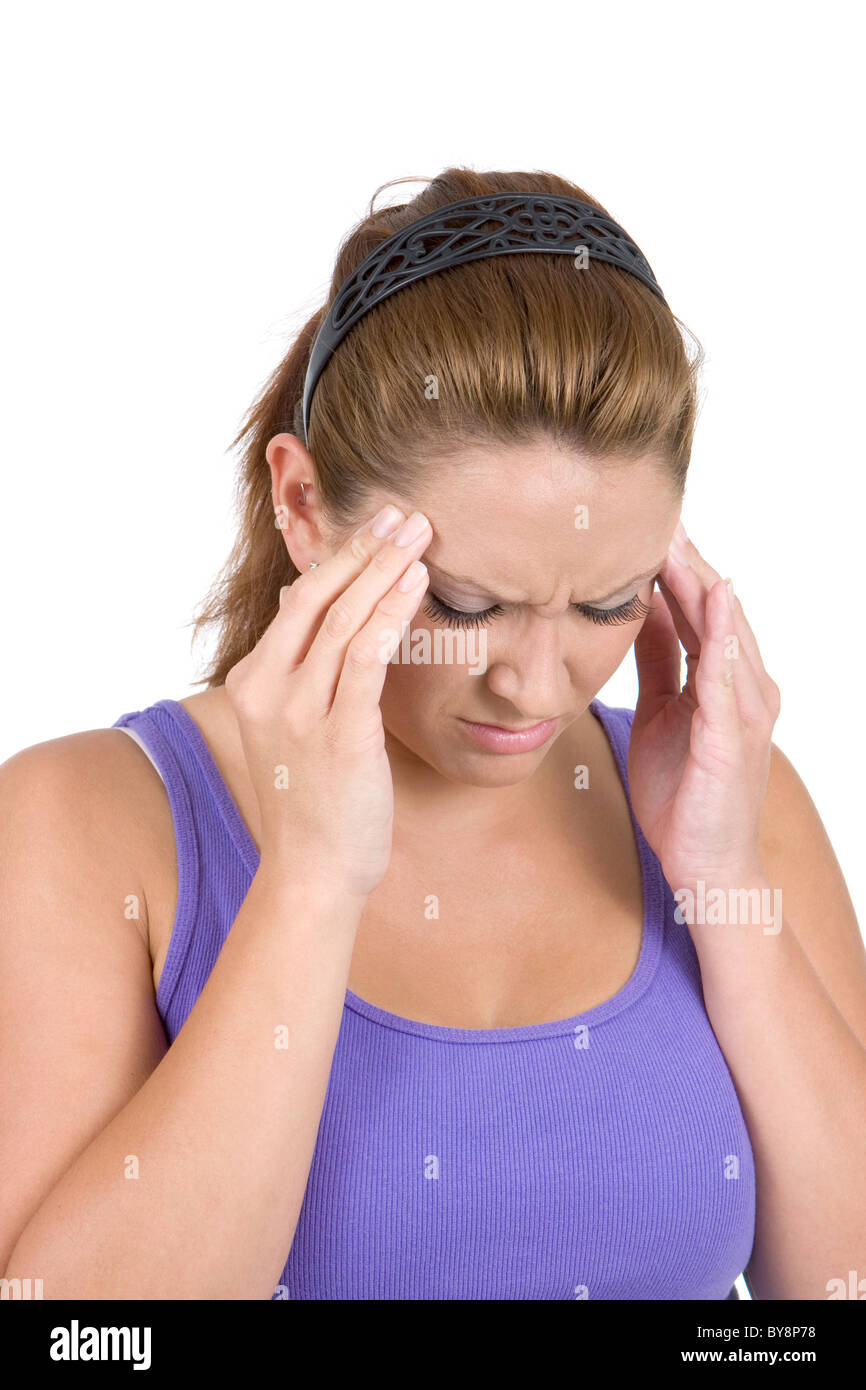 Frau hält ihre Tempel in Schmerzen, die durch eine Migräne. Stockfoto