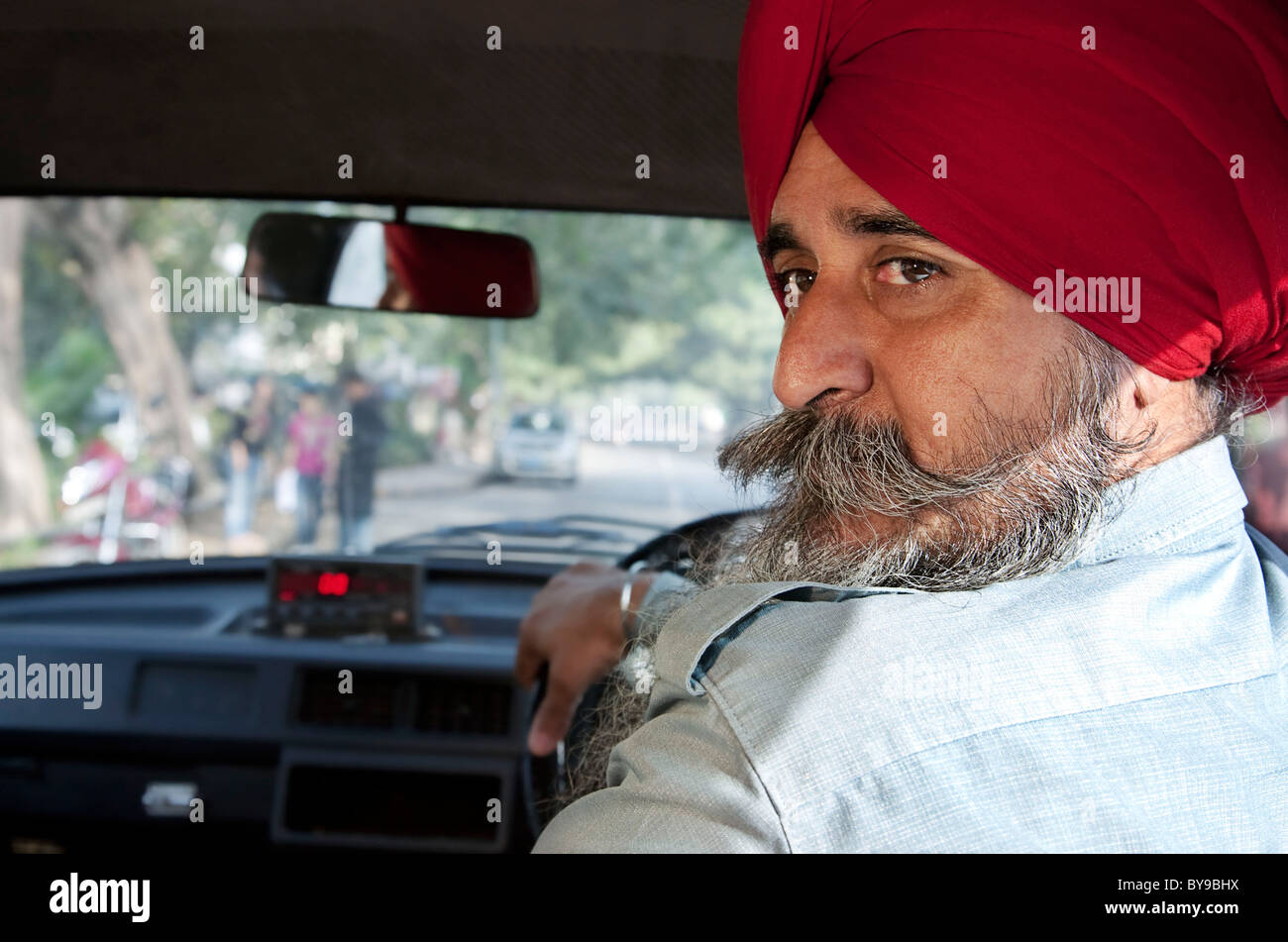 Porträt von einem Sikh Taxifahrer Stockfoto