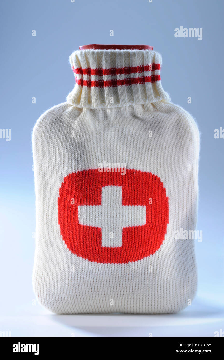 Wärmflasche mit einem roten Kreuz, erste-Hilfe-kit Stockfoto