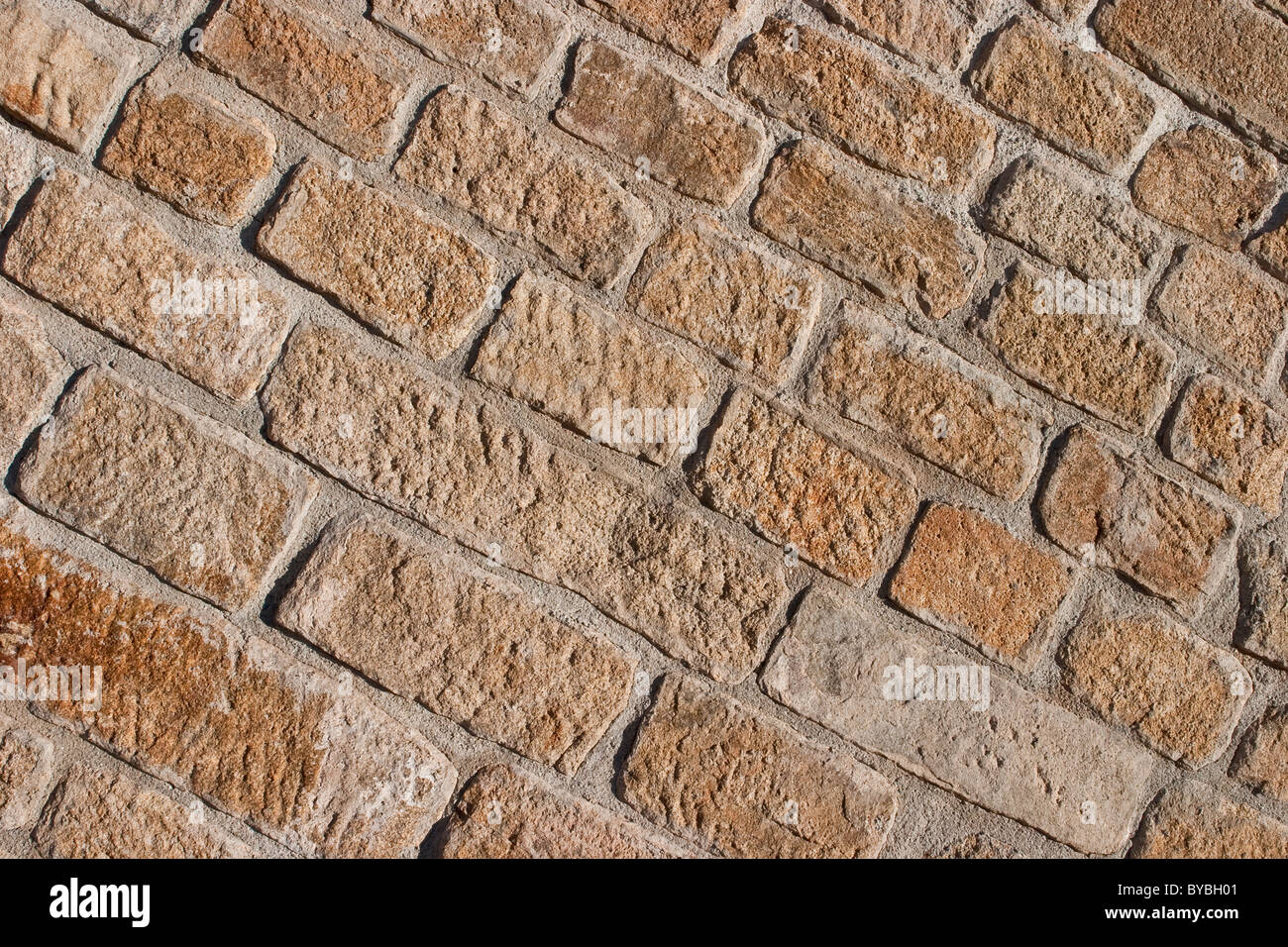 Sandstein gemauerte Wand Hintergrund Stockfoto