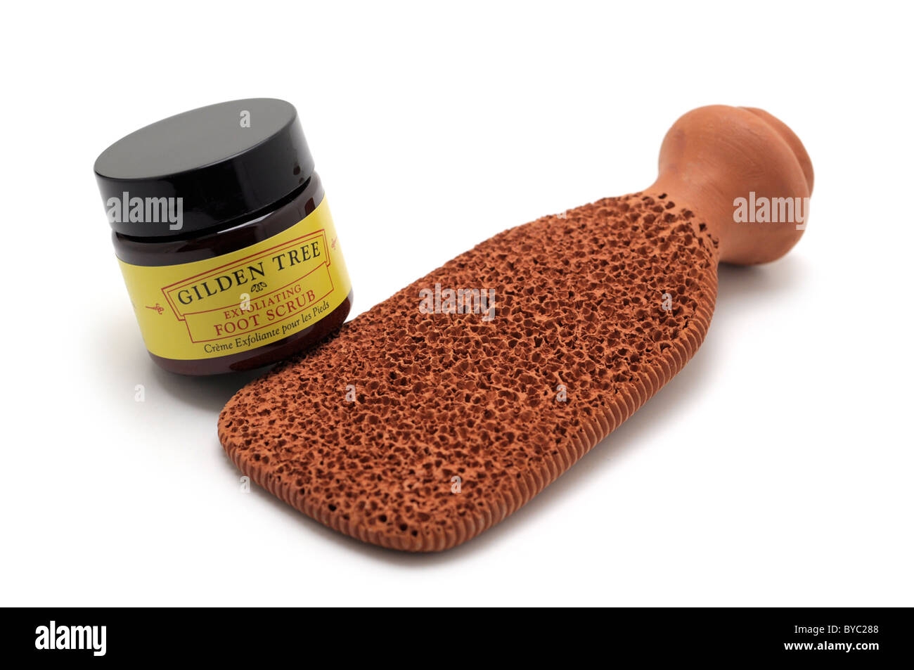 Bimssteingranulat - Terra Cotta mit Peeling Fuß Peeling Creme Stockfoto