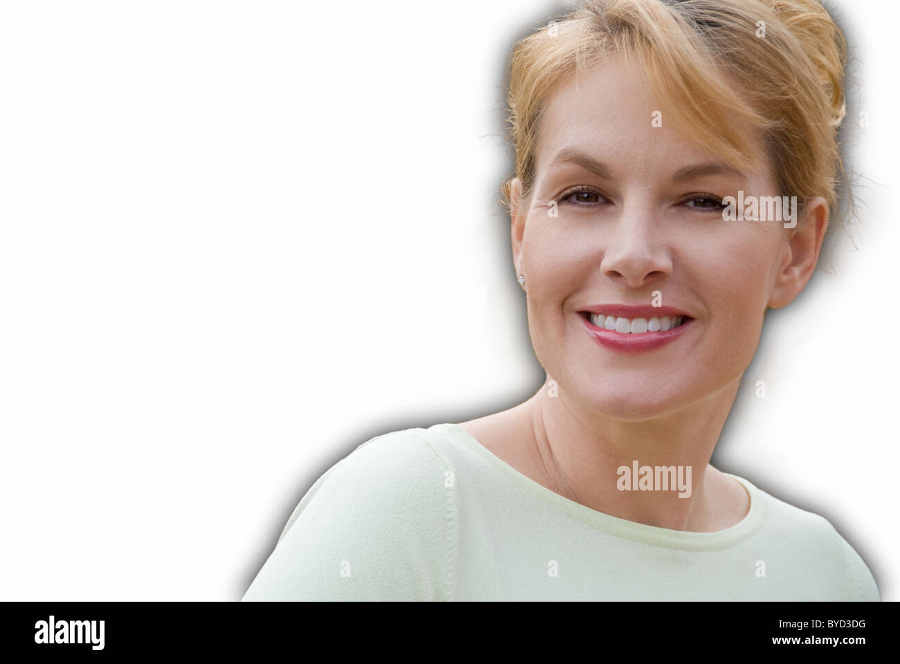 Porträt der glückliche Frau vor weißem Hintergrund Stockfoto